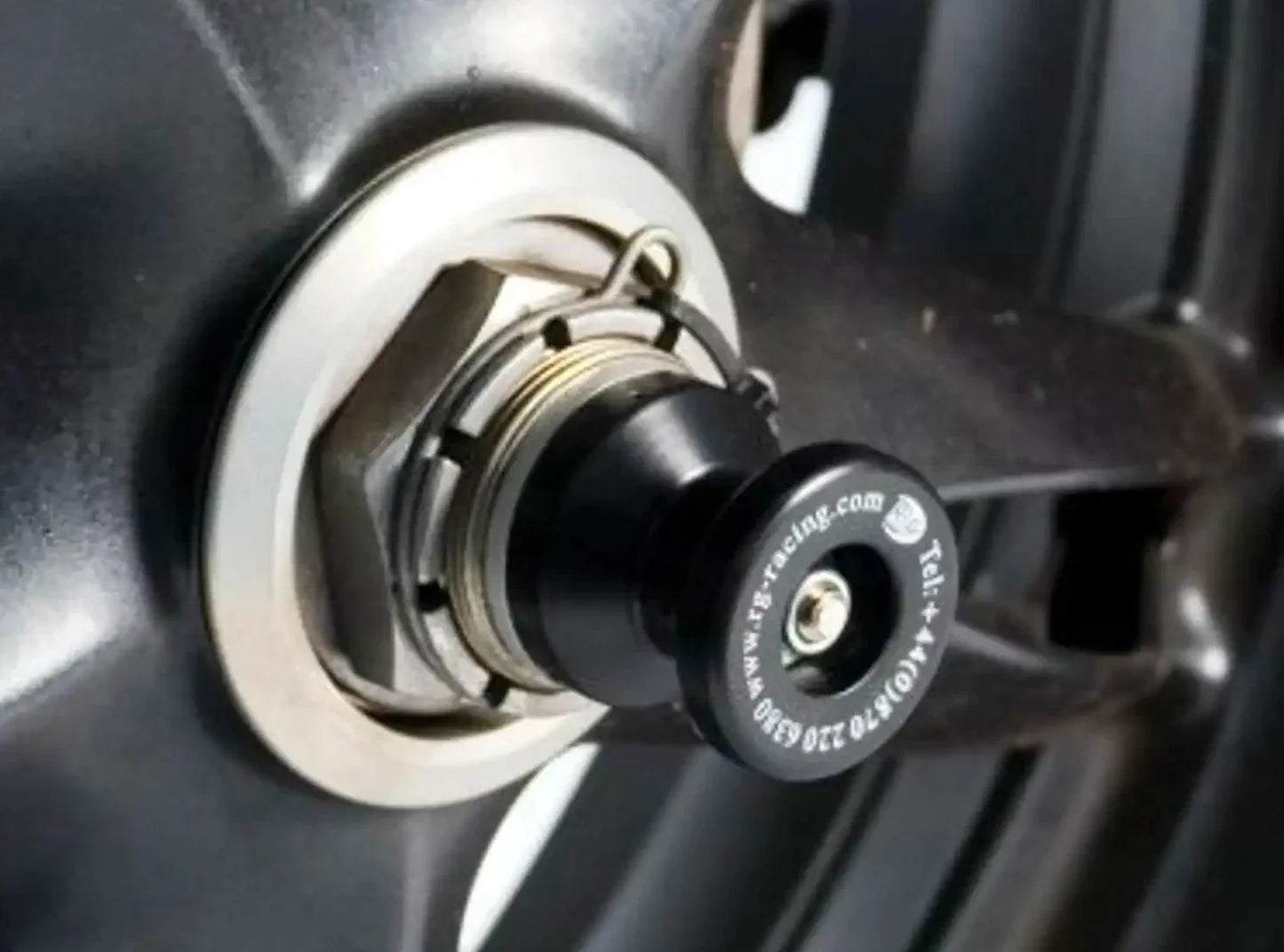 SS0007 - R&G RACING Triumph Daytona 955 / Speed Triple Rear Wheel Sliders (paddock stand bobbins)