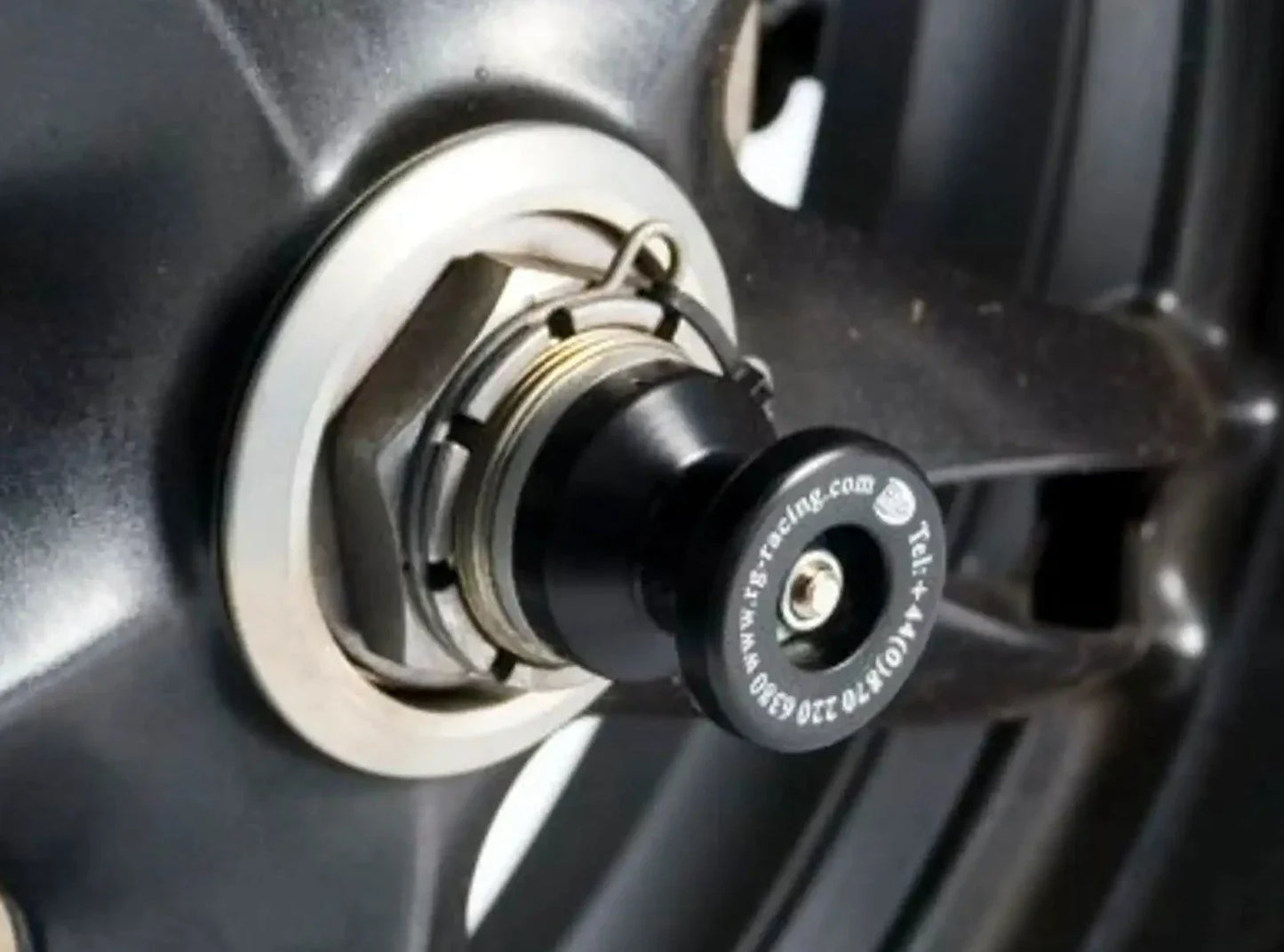 SS0007 - R&G RACING Triumph Daytona 955 / Speed Triple Rear Wheel Sliders (paddock stand bobbins)
