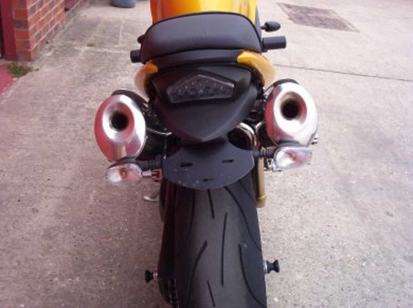 SS0001 - R&G RACING Triumph Daytona / Speed Four Rear Wheel Sliders (paddock stand bobbins)
