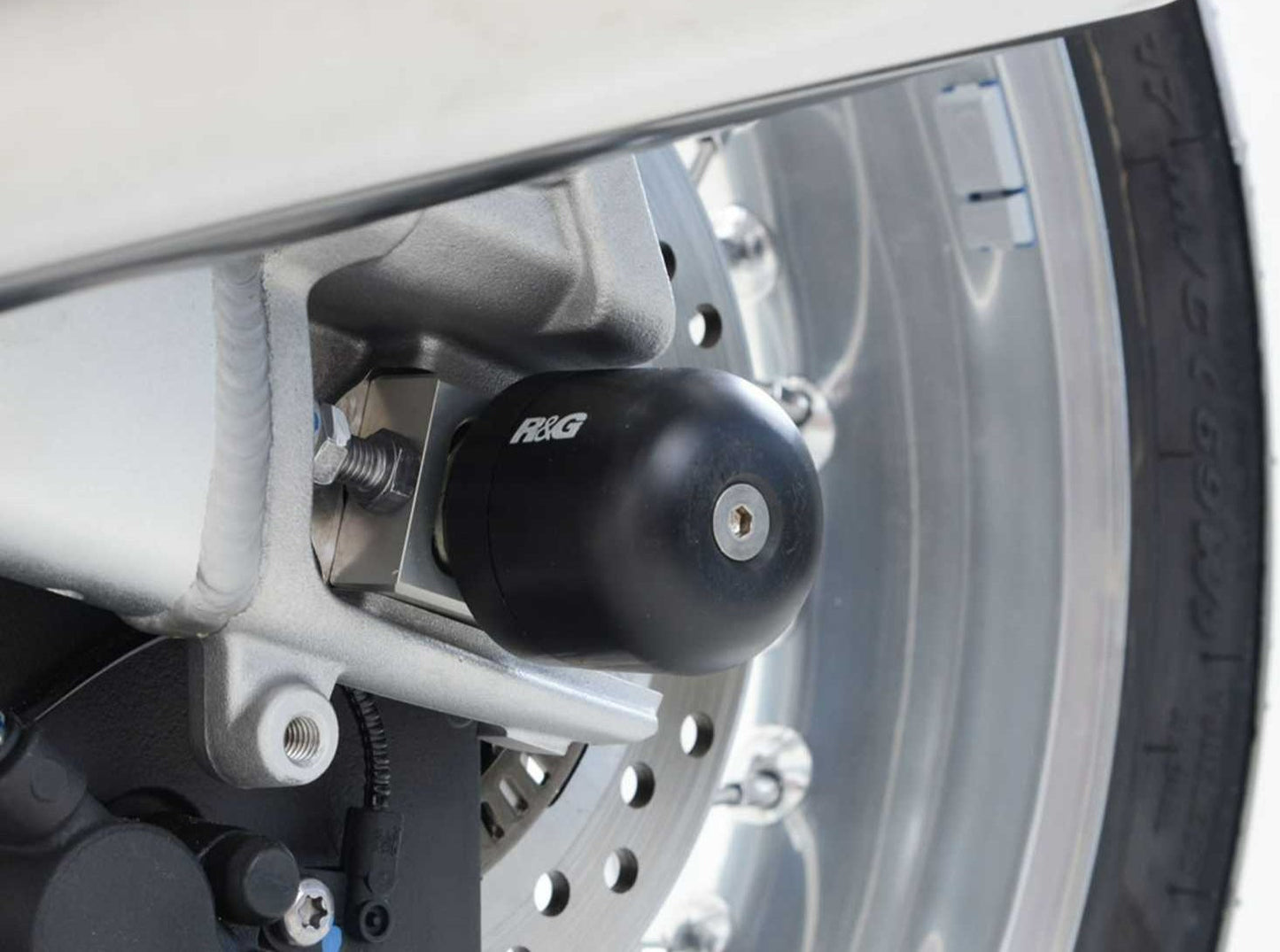 SP0071 - R&G RACING Triumph Scrambler / Thruxton Rear Wheel Sliders (swingarm)