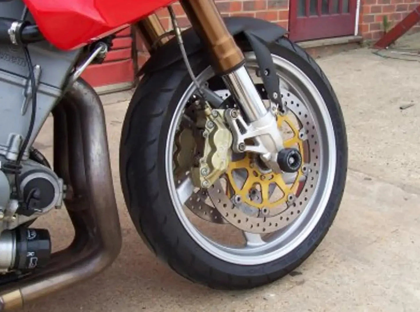 FP0034 - R&G RACING Benelli Tornado RS / TNT / Tre K Front Wheel Sliders