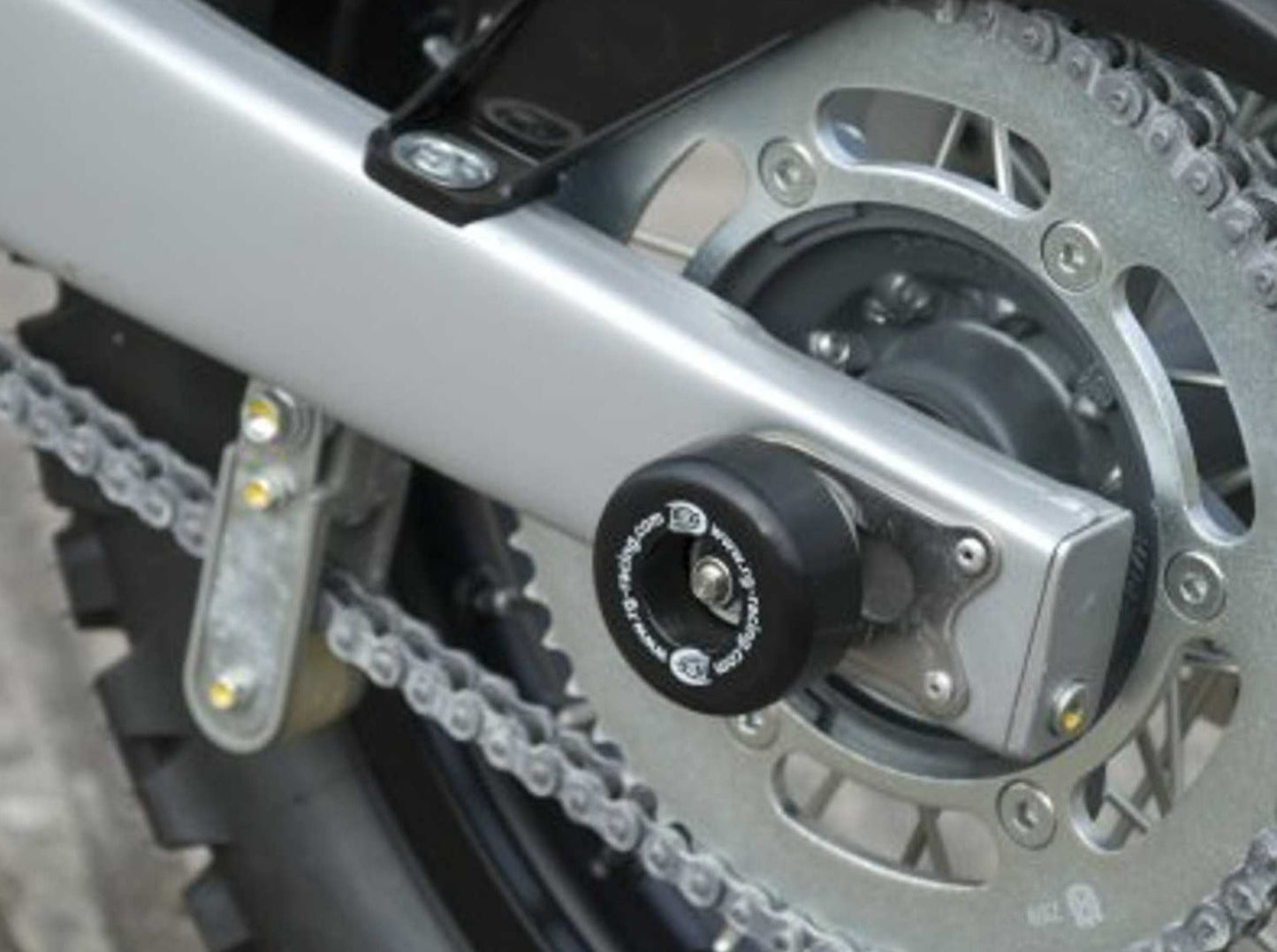 SP0042 - R&G RACING Husqvarna TE125 / SMR 630 Rear Wheel Sliders (swingarm)