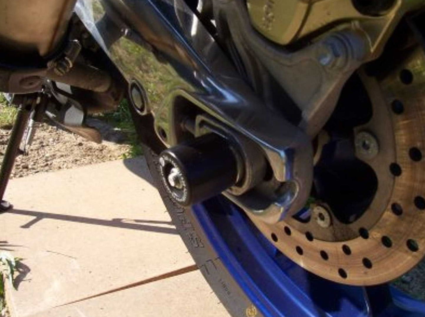 SP0017 - R&G RACING Aprilia RS125 Rear Wheel Sliders (swingarm)